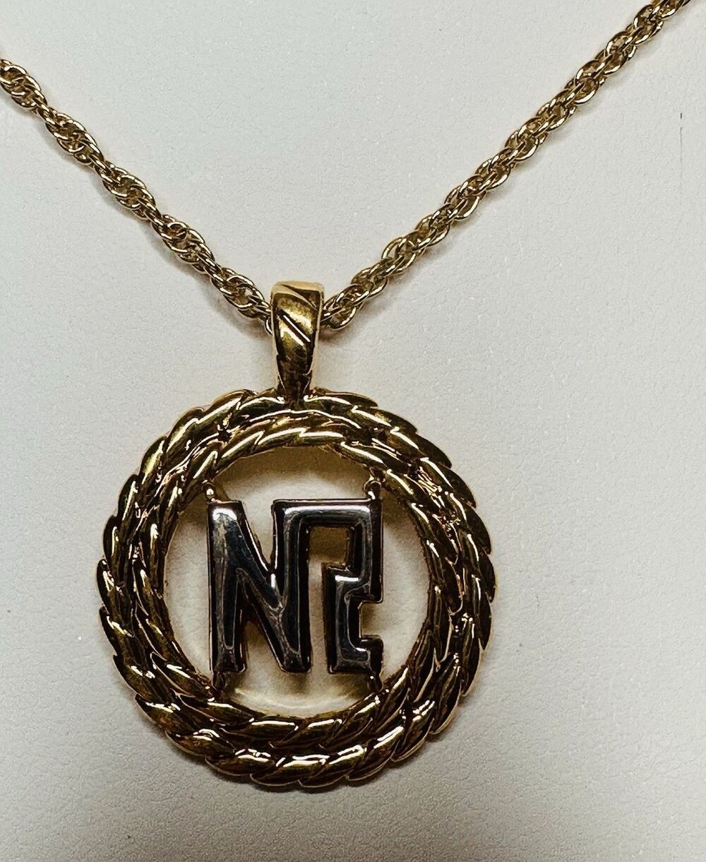Nina Ricci 22kt Gold Plated NR Monogram two tone silver/gold Pendant Necklace